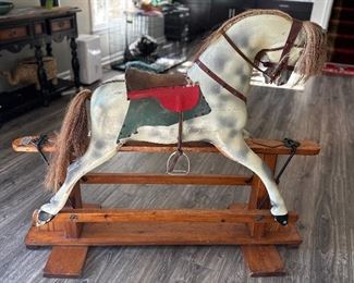 ‘Slider Rocking Horse’ - older model.  This rocking horse was made in England and can withstand 200 pounds.  This piece is for the sentimental at heart whether you have a little boy or a little girl, or maybe a grand baby - this piece is a heartwarmer.  Cannot be reduced in price.