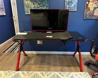 Super cool gaming desk with all of the bells and whistles!!  The matching black and red chair can also be purchased!!
