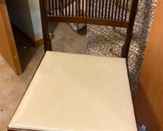 One of four folding chairs