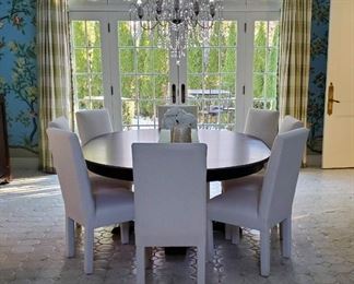 Oval Canadel table dining table with two leaves.                     TABLE IS WITHRAWN