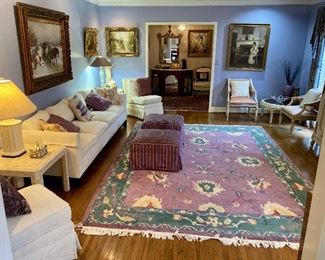 Purple and green hand knotted wool area rug
8’7” x 12’