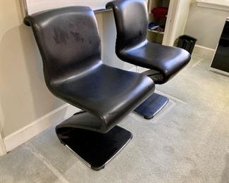 Pair of leather “Z” chairs by Gastone Rinaldi for RIMA