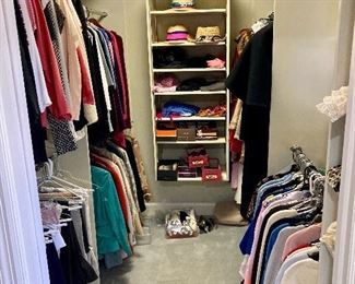 Closets full of designer womens clothing