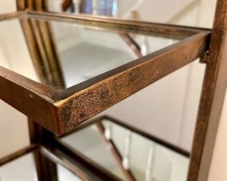 Close up image showing the finish of the hanging etagere. 