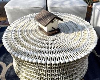 Outdoor resin table by Oly Studios. Purchased for $2000, YOURS FOR $850. Needs a good cleaning. Has a hairline chip in finish. Very sturdy, statement piece! 40" D, 17" H