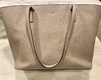 SOLD Kate Spade tote. Color is hard to see here; matte taupe color. Not gold as it appears. 18 x 10
