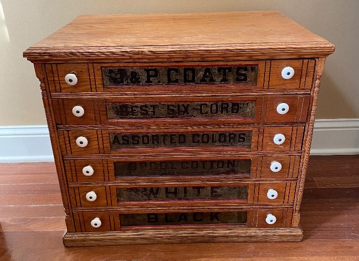 Vintage J&P Coat Spool Cabinet measures 24.5x17x20 inches. There is some vintage wear including scratch marks. 