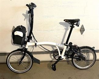 Brompton 2 Speed Bicycle with Brooks Seat and 16 inch tires. This bike is in good/used condition.