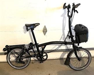  Brompton 2 Speed Bicycle wth Brooks Seat and 16 inch tires. This bike is in good used condition.