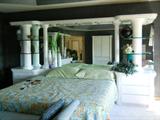 portion of the fabulous king sized bedroom suite