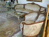 This is one of two carved French styled sofas that we have, this one has a matching chair.