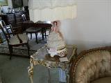 We have a pair of these lace doll lamps, both are in mint condition.