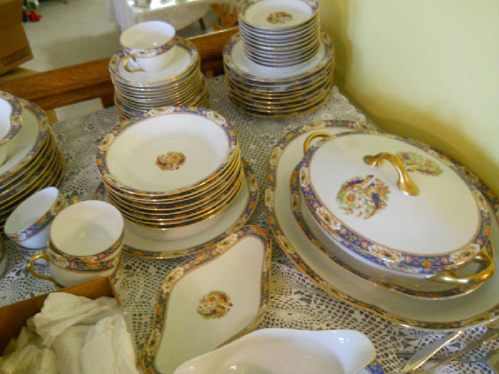 one of four different sets of fine china, this one is Limoges