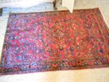 one of four Oriental area rugs in home
