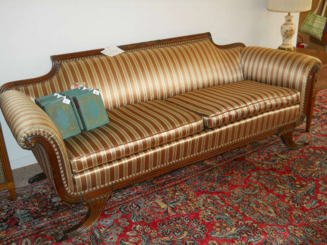 antique/vintage Empire styled sofa, wonderful condition, sitting on a fabulous Sarouk room sized rug in near mint condition. YUM