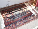 stack of antique/vintage Persian area rugs, all in wonderful condition