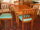 dining room table has 6 chairs, buffet and china cabinet