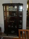 Antique curved glass china cabinet