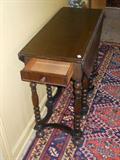 Berkeley and Gay antique drop leaf table in Walnut