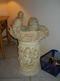 this is a fountain featuring cherubs and angels, not hooked up, of course