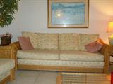 we have 2 of these great looking rattan sofas