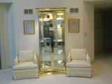 to die for, a glass and brass large sized curio cabinet