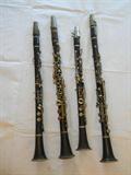 four old clarinets, each is marked France