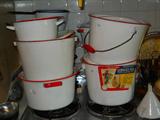 we have tons of this old white/red enameled cookware, most of it has the original labels on them, never used
