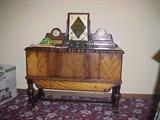 1930's art deco designed tall cedar chest with mirror and clock