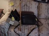 four new, never used Coach leather handbags