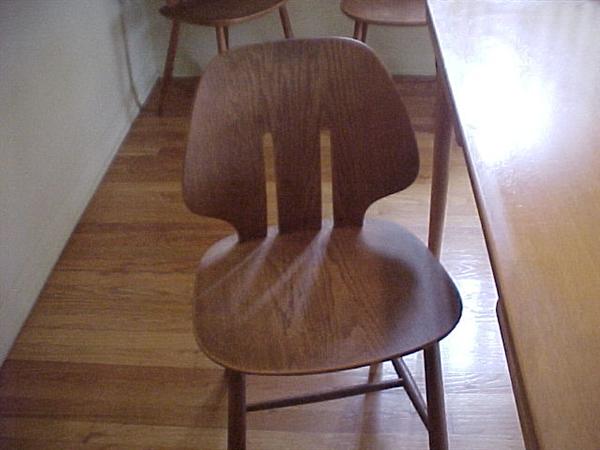 set of eight molded plywood chairs