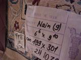 label on backside of Persian room sized rug