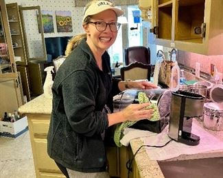 Rebecca helping Tiffani in the kitchen. Design degree!