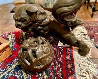 Cast iron Foo dog with ball.