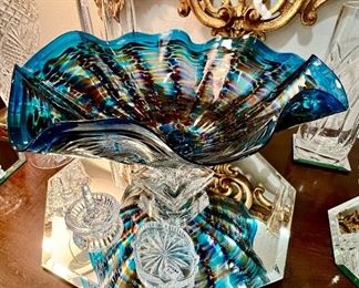 One of my favorite pieces!  Signed blue ruffled bowl on base.  The reflection off the mirror is amazing!