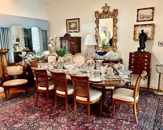 We moved the dining room into the living room!  It was a perfect fit. The richness of the rug, the openness of the space, the width of the wall really accentuated it all!