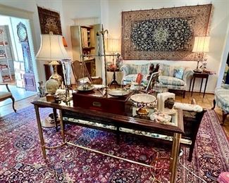Note the brass legs on this cool vintage sofa table.