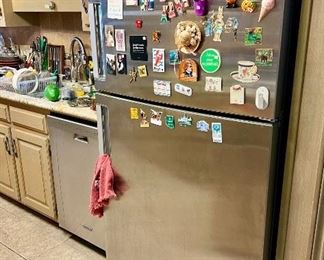 Whirlpool WP stainless refrigerator.