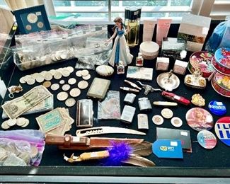 Interesting eclectic items in case.