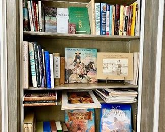 N.C. Wyeth collection of vintage and modern books.  Texana on top.