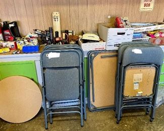 2 card tables with padded chairs.