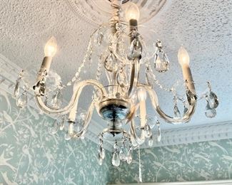 Four arm Waterford chandelier great for entryways.