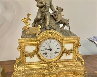 Vintage French gilt mantle clock with Putti and goat