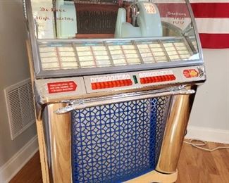 1953 Seeburg 100g Jukebox. New Chrome, new glass, new wood veneer.  Amazing restoration, plays great, fantastic sound.  Looks like it just came out of the factory.  Full of 45's! 1953 Seeburg 100g lovingly restored to showroom condition. Plays and operates great. Original speaker fills the room. All chrome professionally redone. Veneer redone to match original specs. Brand new glass dome topper with authentic decals. Holds 50 records for 100 plays. Sounds as great as it looks. A real showstopper for any home lounge or entertainment room. PRESALE IS OFFERED ON THIS JUKEBOX TREASURE! Contact us at lottstreasures@gmail.com