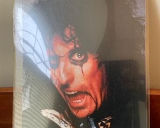 Signed by Alice Cooper at aBMW golf tournament.