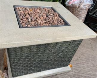 Fire pit with cover. Available on the online estate sales.net marketplace sale.