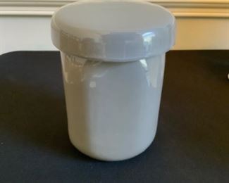 Grey ceramic jar with lid.