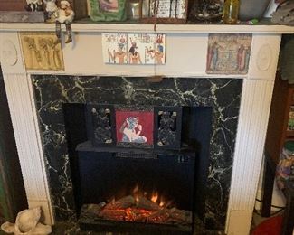 Wooden fake fireplace, realistic appearance. Electric insert with heat settings and life-lie flames