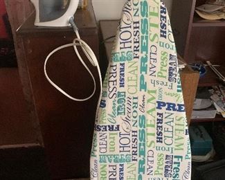 flat iron.ironing board. sm ladder