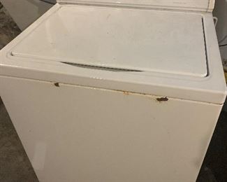 Clothes washer..couple of rust spots but performs very well..takes xtra lg load
